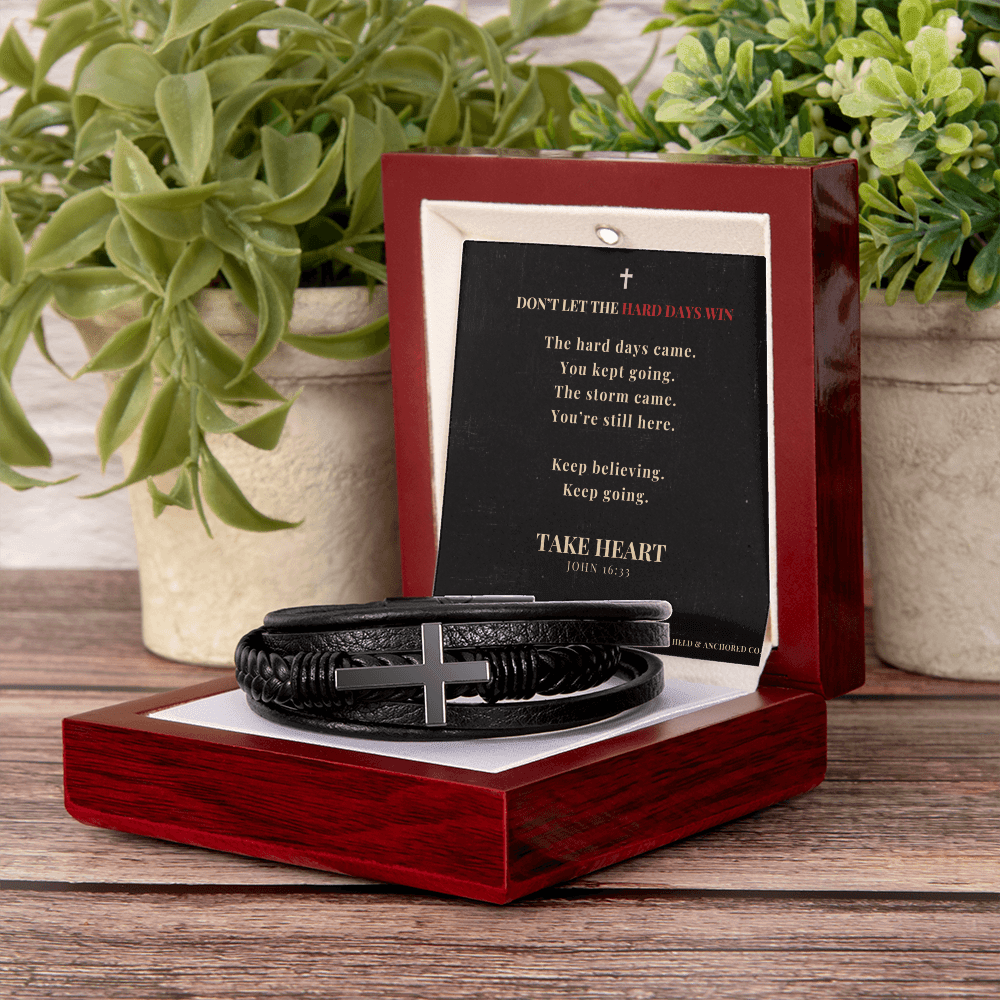 Men's black leather cross bracelet in luxury gift box with inspirational message card.
