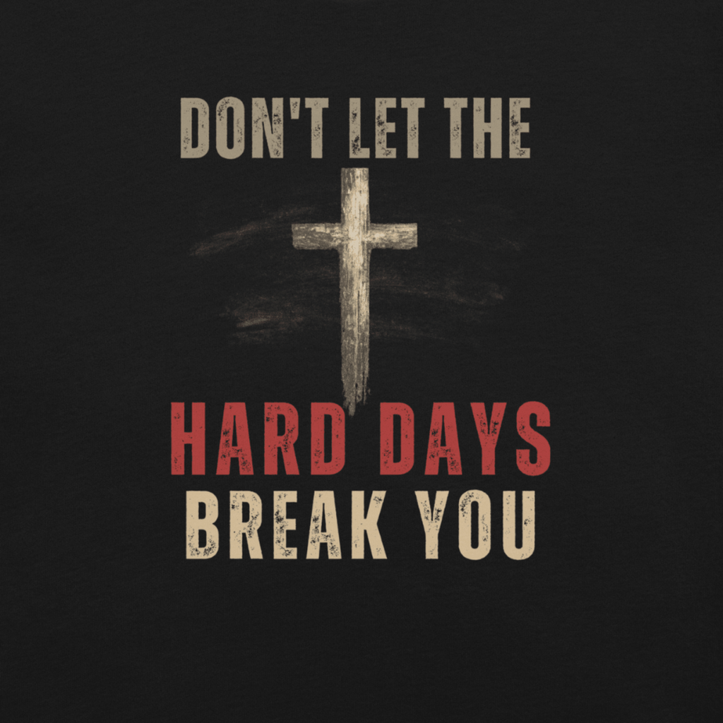 Close-up of distressed cross graphic on Don’t Let the Hard Days Break You black faith-based t-shirt
