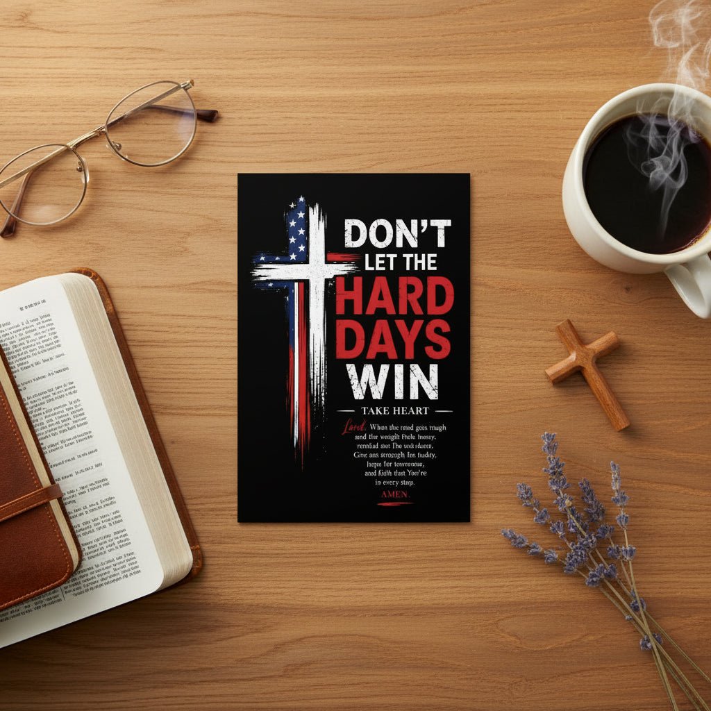 Christian encouragement postcard featuring a patriotic cross and “Don’t Let the Hard Days Win” message displayed on a wooden coffee table beside a Bible, coffee cup, glasses, and wooden cross.