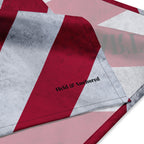 Close-up detail of the Don't Let the Hard Days Win bandana featuring a distressed American flag pattern with Held & Anchored branding printed near the hem.